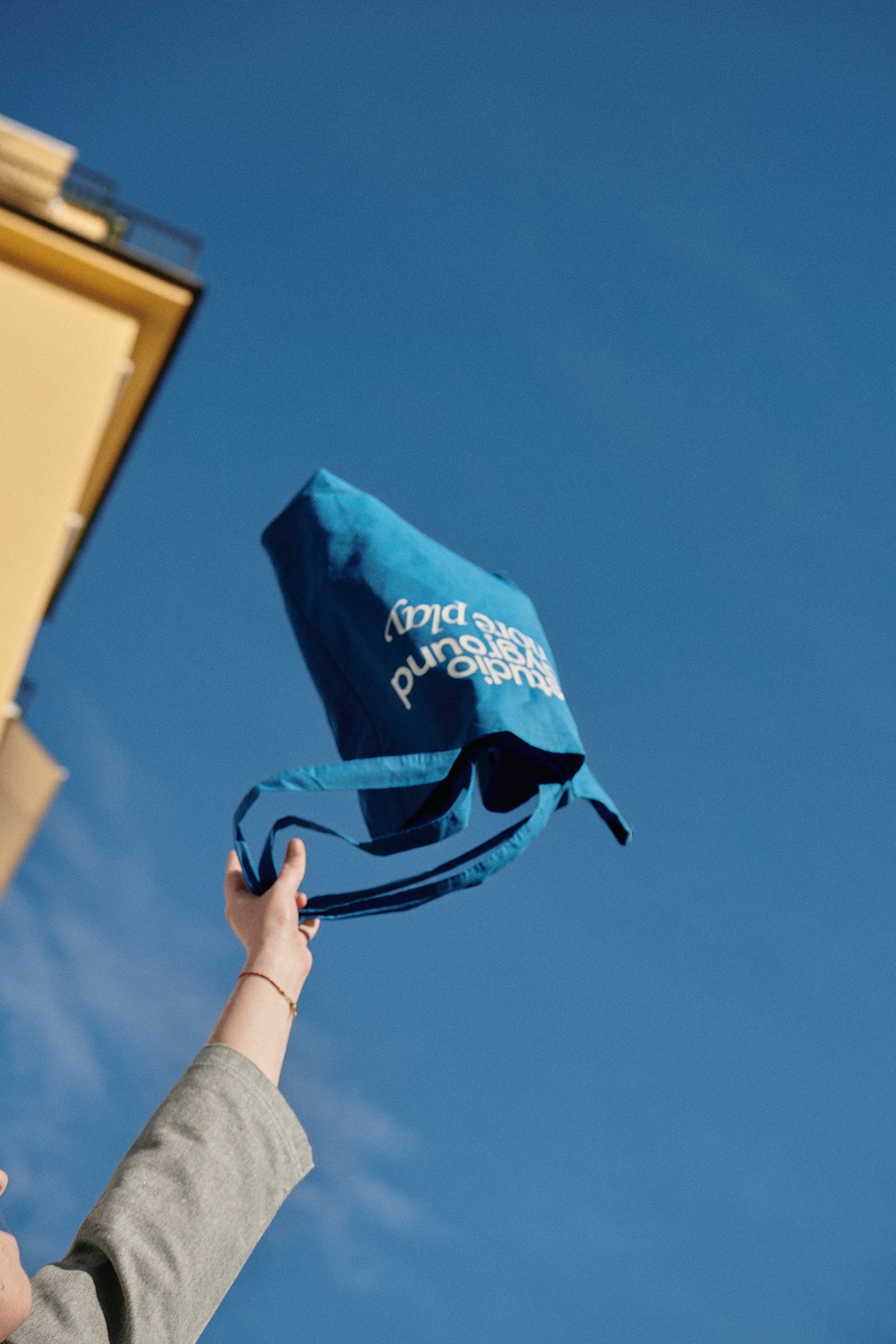 'more play' tote bag