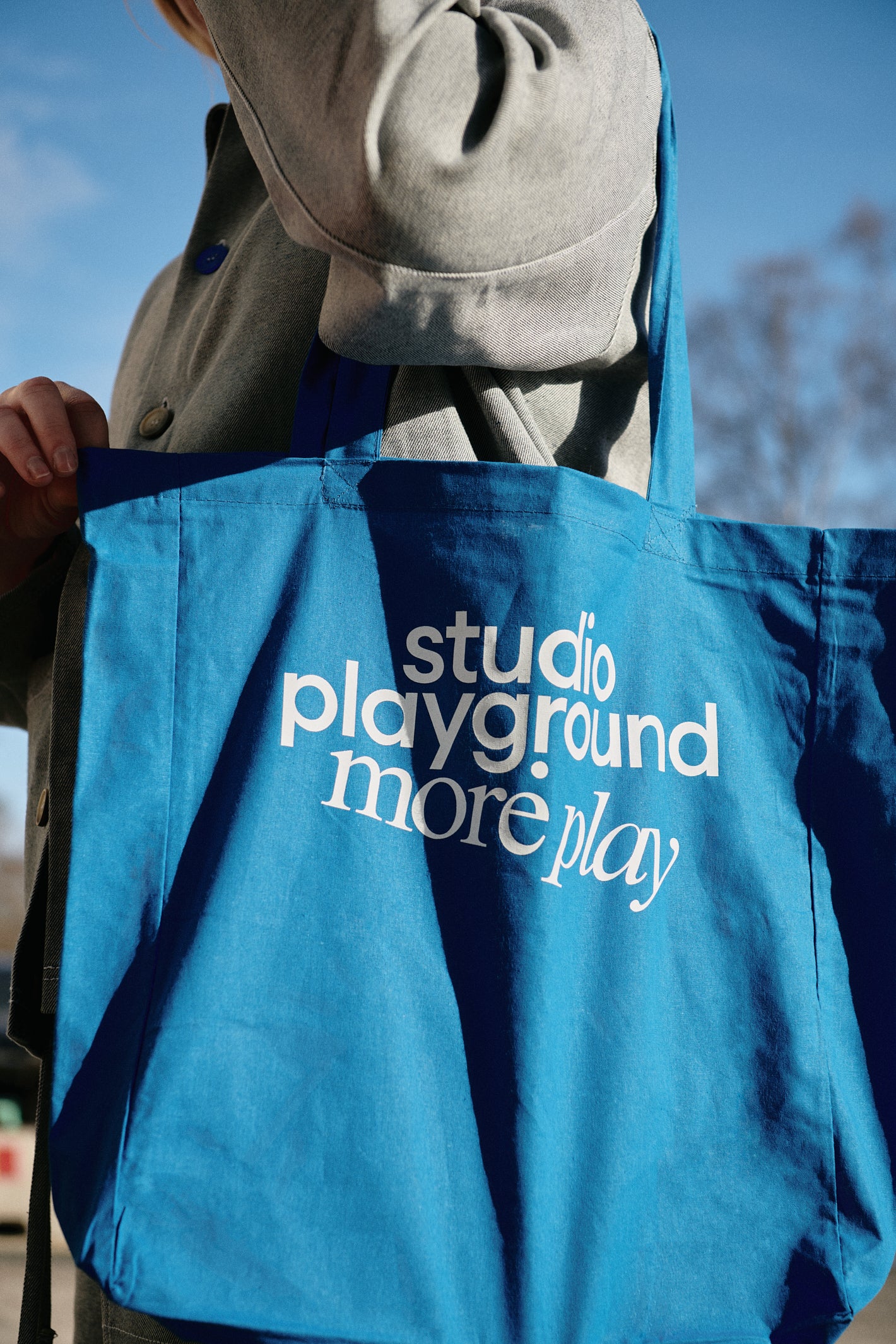 'more play' tote bag
